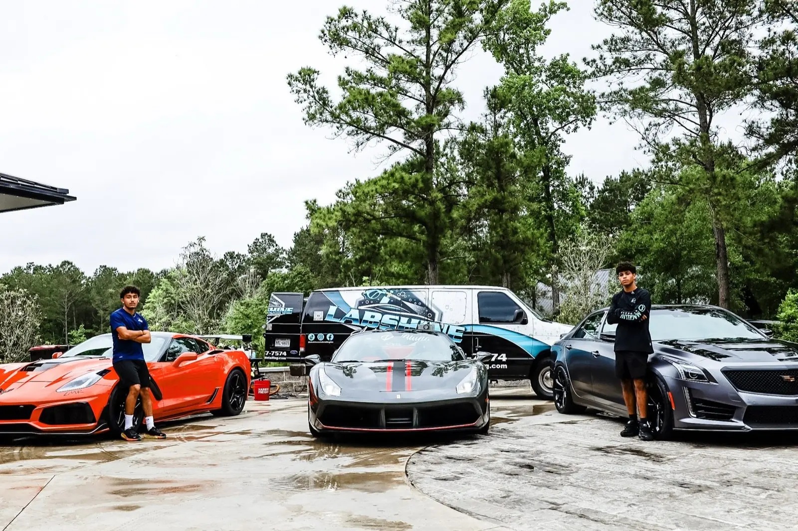 LabShine Auto Detailing team — Adrian Medina and technician with exotic car lineup, The Woodlands TX